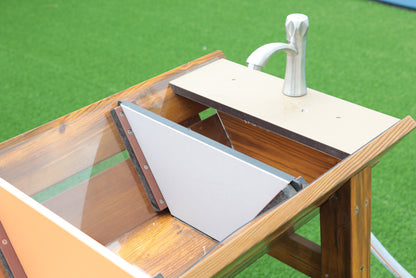 Water and mud play area, dam