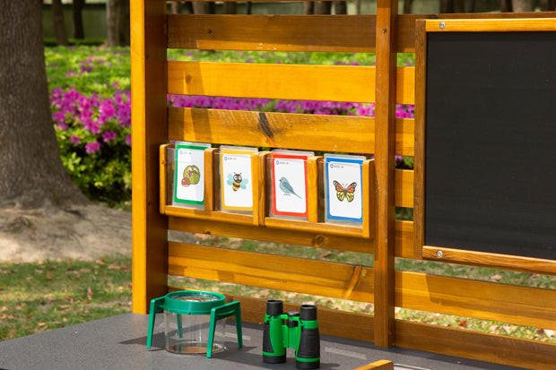 Outdoor discovery station with map set, viewing boxes, observation box, pliers, net, magnifying box and much more.